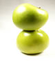 Green apples standing on each other